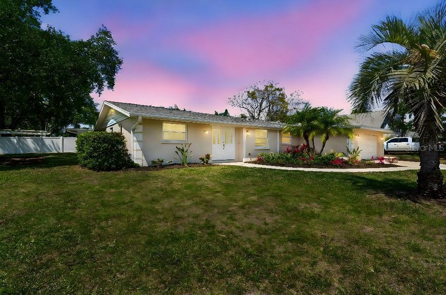 Located in the heart of Sarasota just minutes from downtown and the area's world-famous beaches, this beautifully updated 3-bedroom, 2-bath home sits on a giant oversized lot and a fenced backyard – with enough space for an addition or pool which is a rare find in this central location.

The home was fully remodeled to 2007 building code standards and features hurricane-rated impact windows and a high-efficiency air conditioner, offering comfort, safety, and energy efficiency.

Inside, you’ll find an open and spacious floor plan designed for easy living and entertaining. The kitchen features stainless steel appliances and flows seamlessly into the main living space. The primary suite offers a relaxing retreat with a Jacuzzi-style soaking tub and a large walk-in closet.

Step outside to enjoy the paver patio and large canopy, creating the perfect shaded outdoor space for gatherings or relaxing evenings.

One of the most unique features of this property is the large concrete parking pad along the side of the home, allowing convenient RV, Trailer or boat parking—something rarely available within city limits.

Complete with a 2-car garage and located close to downtown Sarasota, Siesta Key, shopping, restaurants, and entertainment, this property offers flexibility, space, and location all in one.

Homes with this much land and parking flexibility in central Sarasota do not come available often. Schedule your showing today!