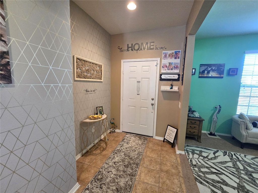 Photo of 848 Petal Mist Lane, Brooksville, FL 34604 (MLS # W7884523)