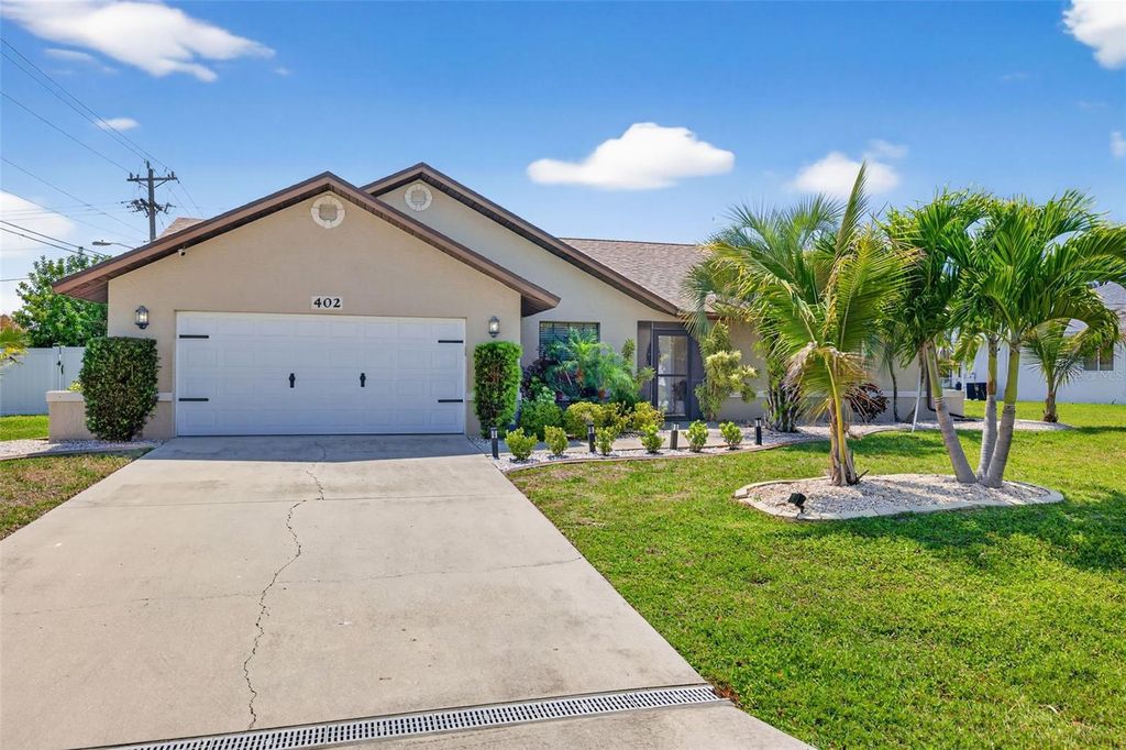 Photo of 402 SW 37th Lane, Cape Coral, FL 33914 (MLS # C7525571)