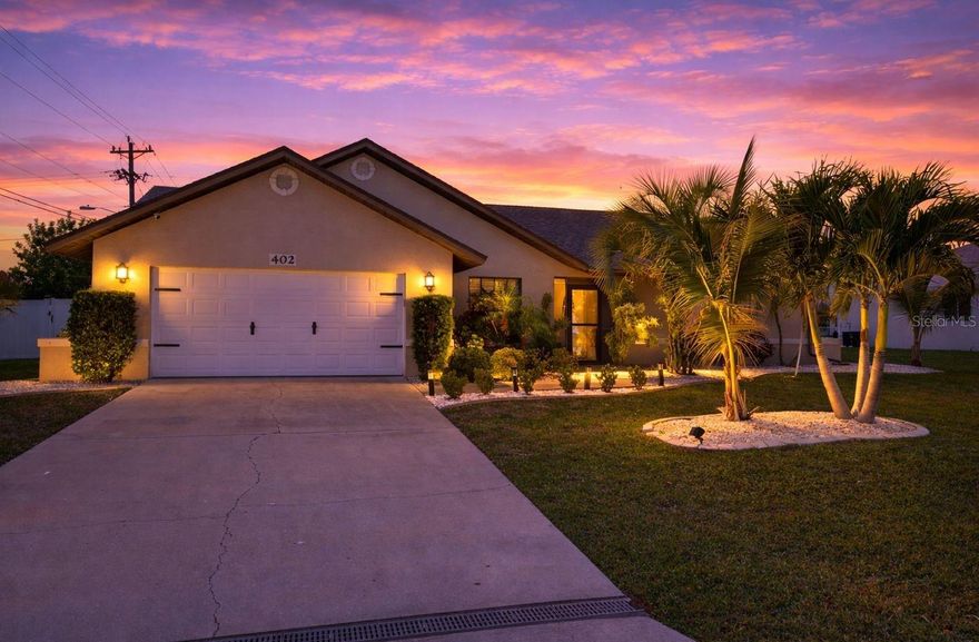 Check out this well-maintained Florida home located in the prosperous Pelican Neighborhood of SW Cape Coral, FL with palms galore! This 3-bedroom home with 2 full bathrooms has a very unique floor plan that feels much bigger than 1,853 sq. ft. – featuring a separate area upon entry currently being used as the game room, which could be used as the living room, along with a separate dining room. The primary bedroom is located on one side of the house, while the guest rooms are located on the opposite side of the house offering plenty of privacy. 

The home features vaulted ceilings in the living room overlooking the kitchen, with additional seating and storage space. This home has tile throughout the entire house and the current owners have made lots of small but very noticeable upgrades throughout that make the home feel warm and comfortable. The lanai is where you will spend most of your time, it’s fully enclosed and has plenty of space to entertain and relax in the heated/cooled saltwater pool and the above ground spa that comes with the house. The home is equipped with accordion shutters on all of the windows, including the lanai area. The main entry door, garage and pool bath doors have been upgraded to impact resistant. The yard is completely fenced in and has a great location on set pavers for you to lay out and soak in that Florida sunshine! The roof was replaced in 2022. Oh, by the way, all of the furnishings seen in the pictures are fully negotiable, this home can be sold TURN KEY! NO HOAs and NO FLOOD ZONE here. Home is conveniently located close to schools, parks, entertainment, shopping and less than 10 minutes to downtown Cape Coral. Ready to see it for yourself? Call your agent today and setup that appointment.