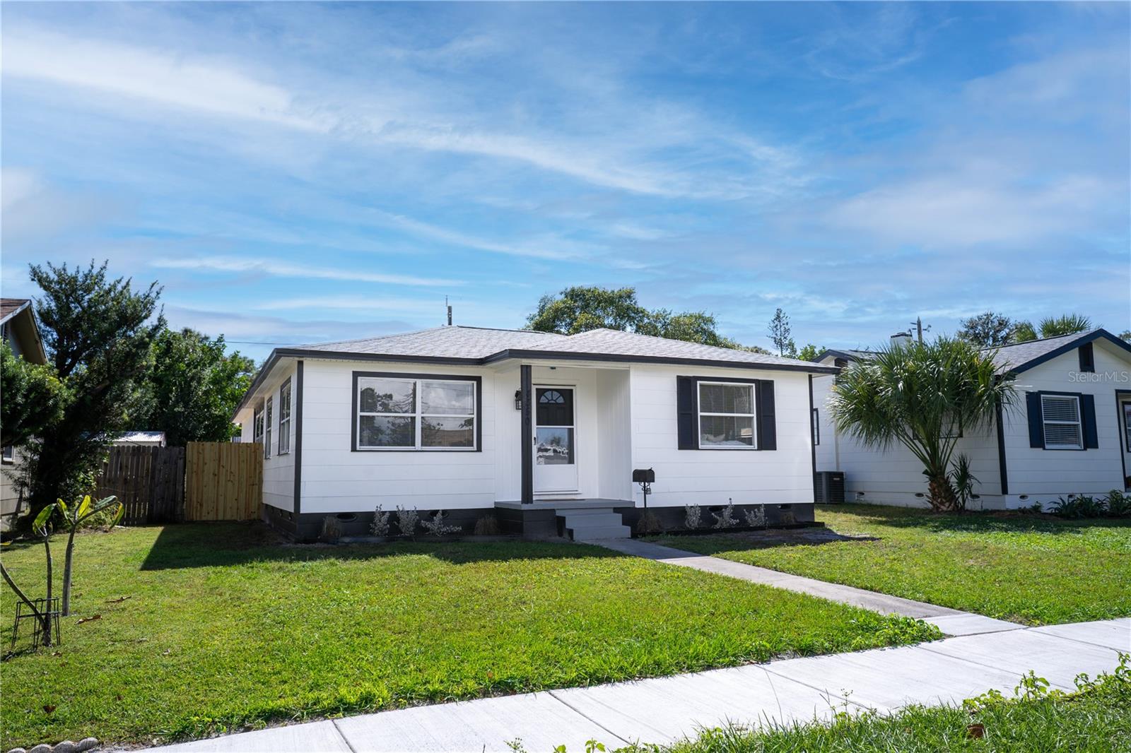 Completely updated and move-in ready, this 2 bedroom, 1 bathroom, 1 car garage home in St. Petersburg has it all! Step inside to find fresh interior and exterior paint, new lighting, and new LVP flooring throughout. The spacious open-concept living room flows into the beautifully updated kitchen featuring stone countertops, stainless steel appliances, a stunning backsplash, recessed lighting, an island, and plenty of cabinet space. Both bedrooms have been tastefully updated, and the bathroom is fully renovated. Enjoy the large fenced backyard—perfect for relaxing or entertaining—with alley access to the attached rear-facing garage and boat parking. Additional updates include a brand-new HVAC system and a newer roof (2021). Located just minutes from the water but in a non-flood zone, and close to parks, beaches, entertainment, shopping, and dining. Don’t miss your chance to make this beautiful St. Pete home yours—schedule your showing today!
