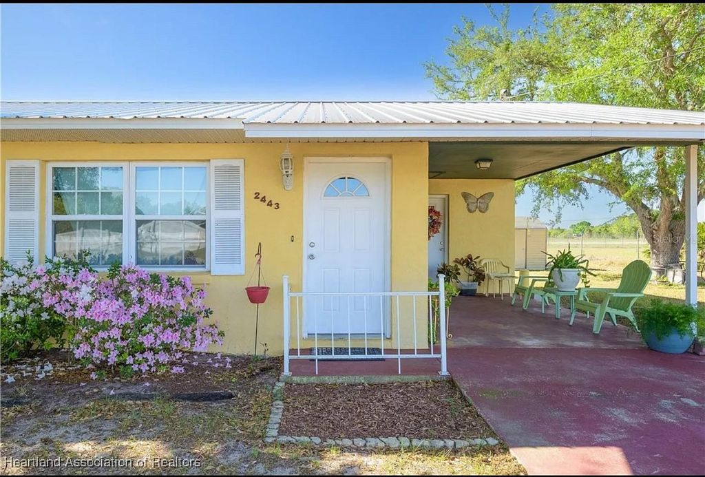 Photo of 2443 W Newton Road, Avon Park, FL 33825 (MLS # O6358351)