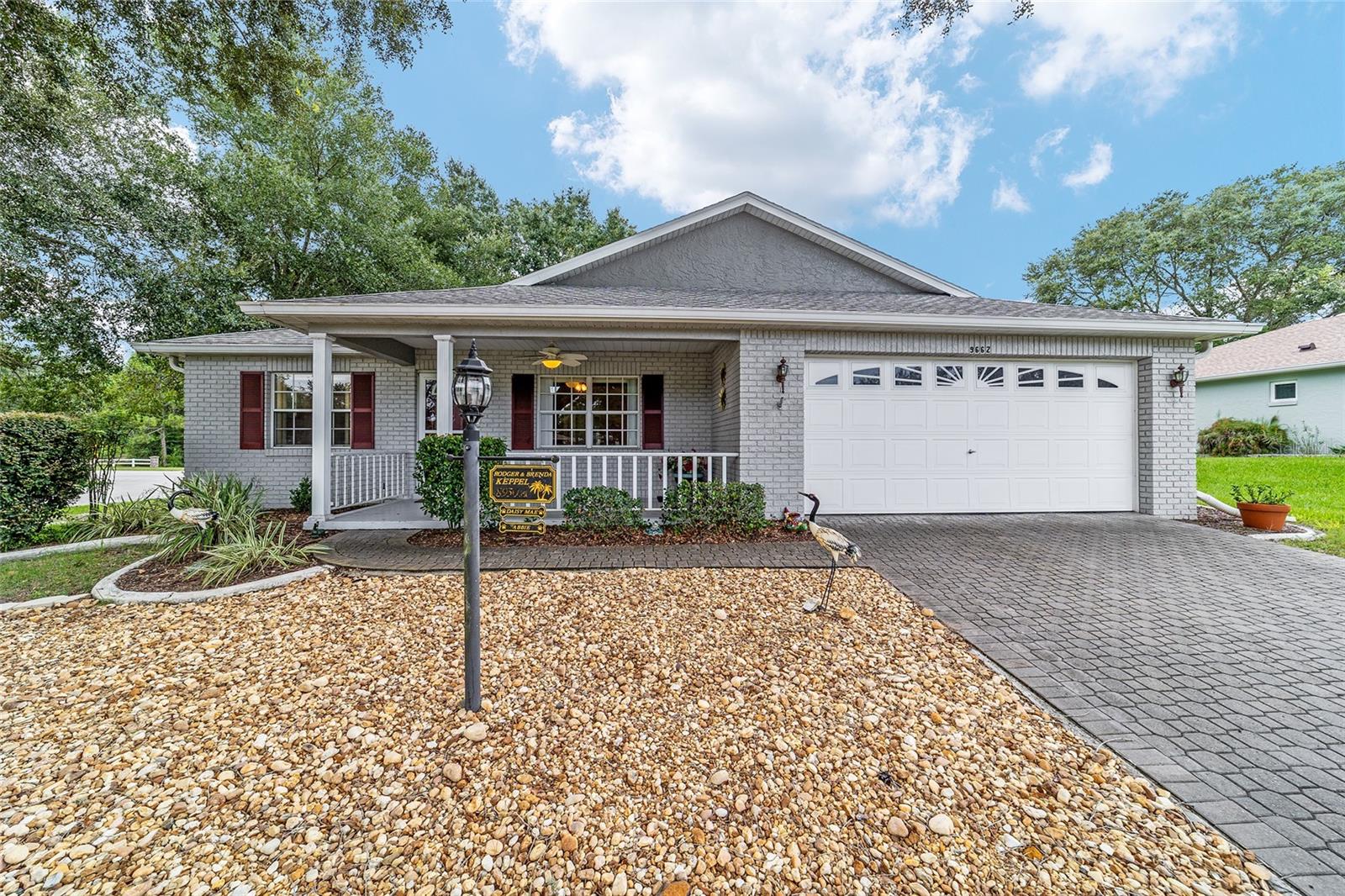Nestled in desirable Crescent Ridge, this beautifully updated 3-bedroom, 2-bath corner home is just steps from Veterans Park and the community mailboxes. Inside, enjoy newly installed luxury vinyl flooring, fresh paint, and generous closets throughout, including a master suite with a spacious walk-in closet. The kitchen is a chef's delight with quartz countertops, a center island with designer lighting, gas stove, and all appliances included, while the baths feature a walk-in tub and raised toilets. Natural light fills the enclosed lanai under air, and a generous laundry room with washer, dryer, and hanging racks adds everyday convenience. Additional highlights include leaf-guard gutters, water softener system, inviting front porch, private fenced patio, and a garage work area with extra shelving. With its thoughtful updates, modern comforts, and ideal north/south exposure, this home is move-in ready--the sellers have already relocated, making it the perfect opportunity for a new buyer to step in, fall in love, and make it their own.