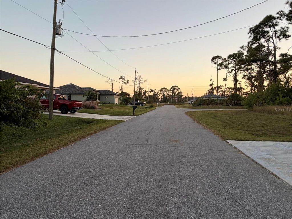 Photo of 113 Opal Dr, Rotonda West, FL 33947 (MLS # C7517770)