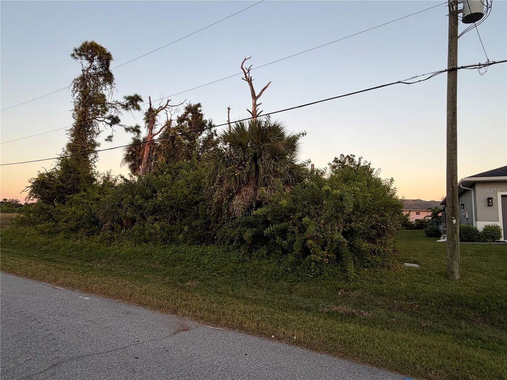 Photo of 113 Opal Dr, Rotonda West, FL 33947 (MLS # C7517770)