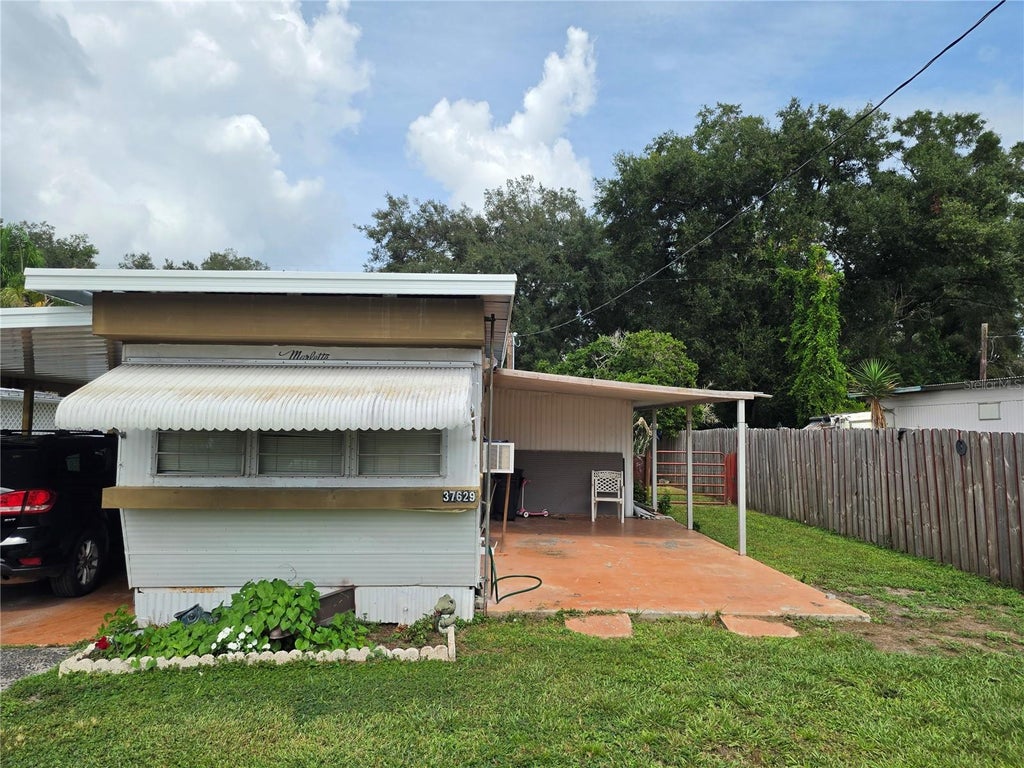 Photo of 37629 March Lane, Zephyrhills, FL 33541 (MLS # TB8554924)