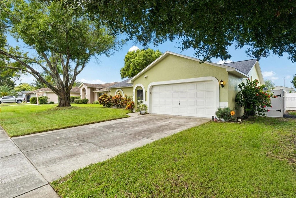 Photo of 7409 Fairwood Avenue, New Port Richey, FL 34653 (MLS # TB8550465)