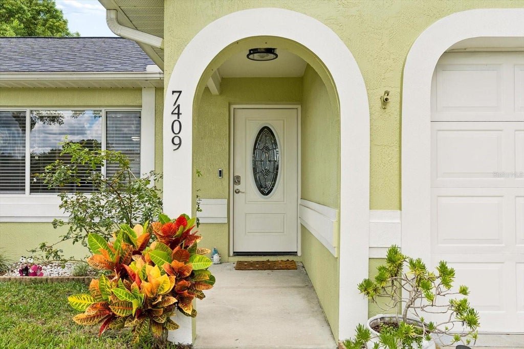 Photo of 7409 Fairwood Avenue, New Port Richey, FL 34653 (MLS # TB8550465)