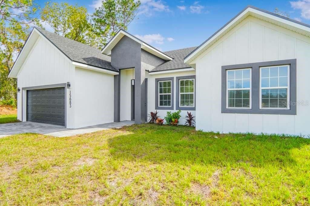 Photo of 2410 SW 147th Lane Road, Ocala, FL 34473 (MLS # O6361180)