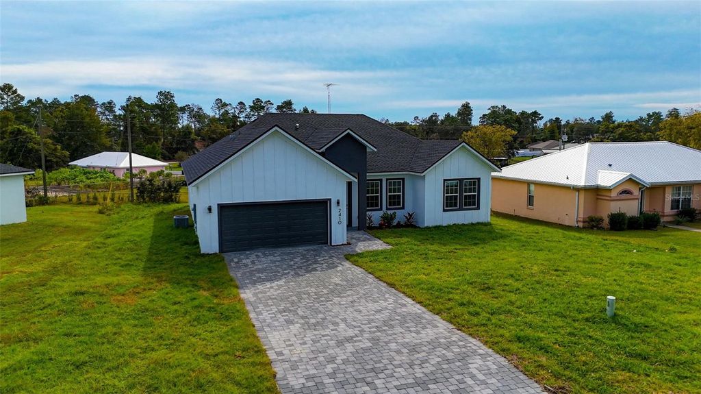 Photo of 2410 SW 147th Lane Road, Ocala, FL 34473 (MLS # O6361180)