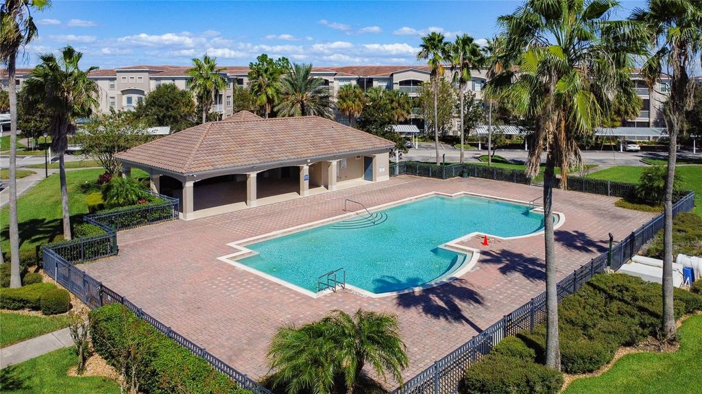 Photo of 3001 Greystone Loop #208, Kissimmee, FL 34741 (MLS # O6340525)