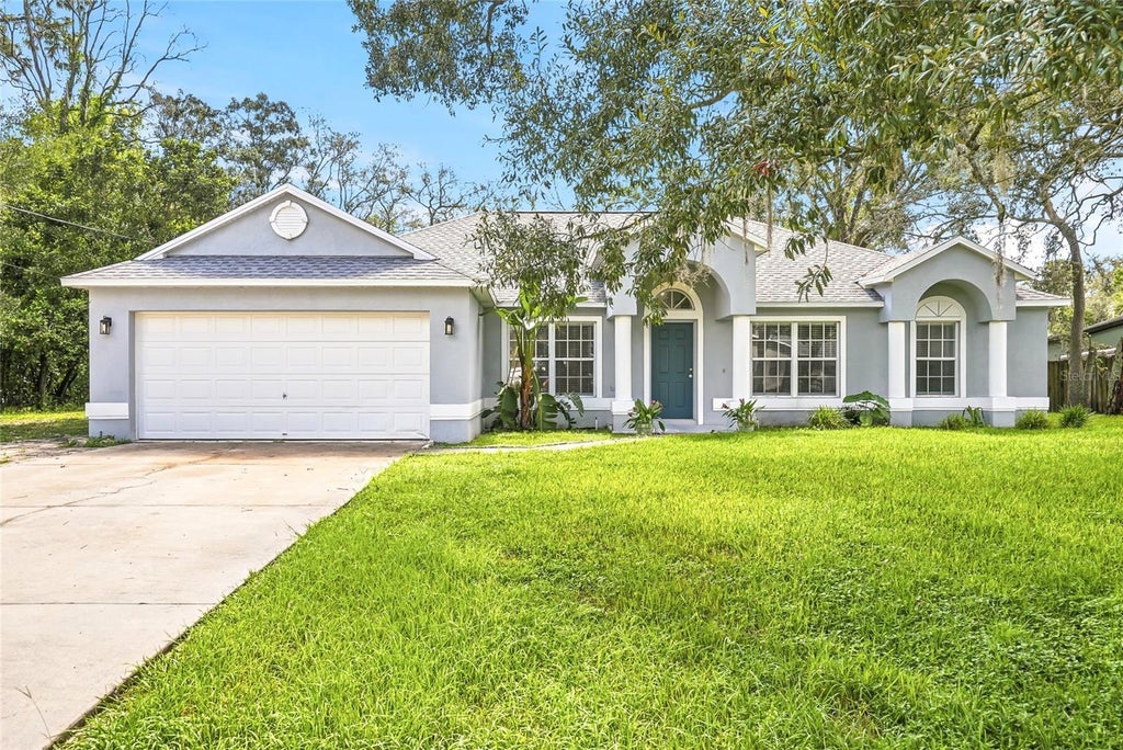 Photo of 2342 Meadow Lark Road, Spring Hill, FL 34608 (MLS # TB8547645)
