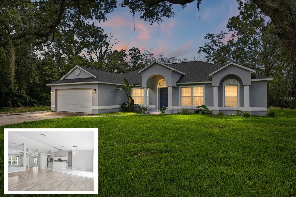 Photo of 2342 Meadow Lark Road, Spring Hill, FL 34608 (MLS # TB8547645)