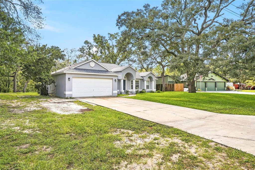 Photo of 2342 Meadow Lark Road, Spring Hill, FL 34608 (MLS # TB8547645)