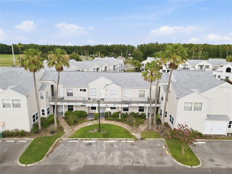 Photo of 2508 Woodgate Boulevard #206, Orlando, FL 32822 (MLS # O6418765)