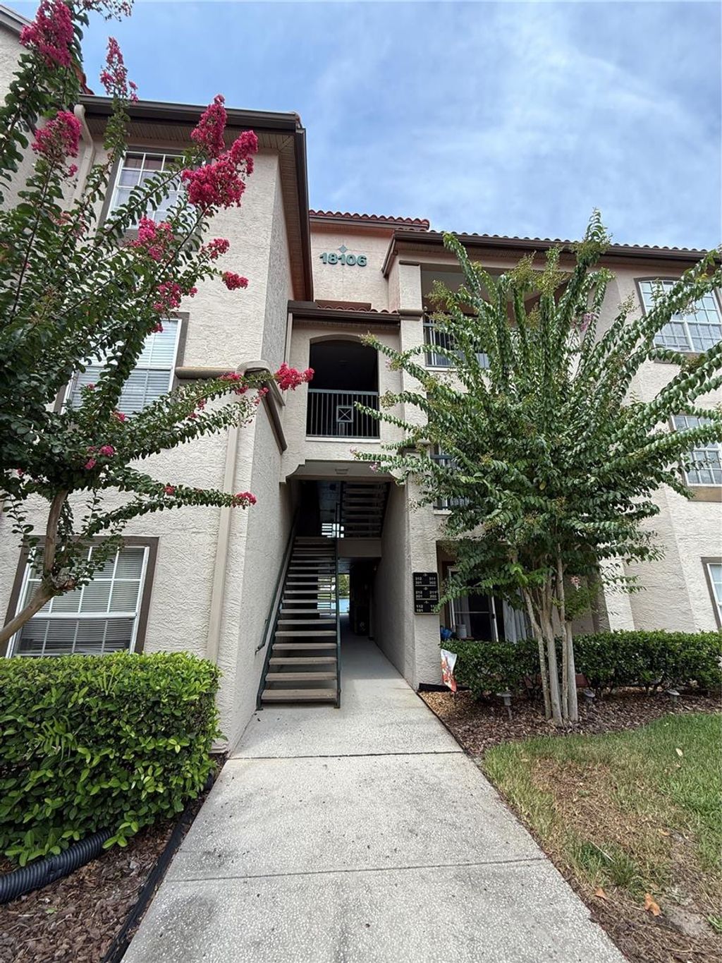 Photo of 18106 Peregrines Perch Place #202, Lutz, FL 33558 (MLS # TB8414317)