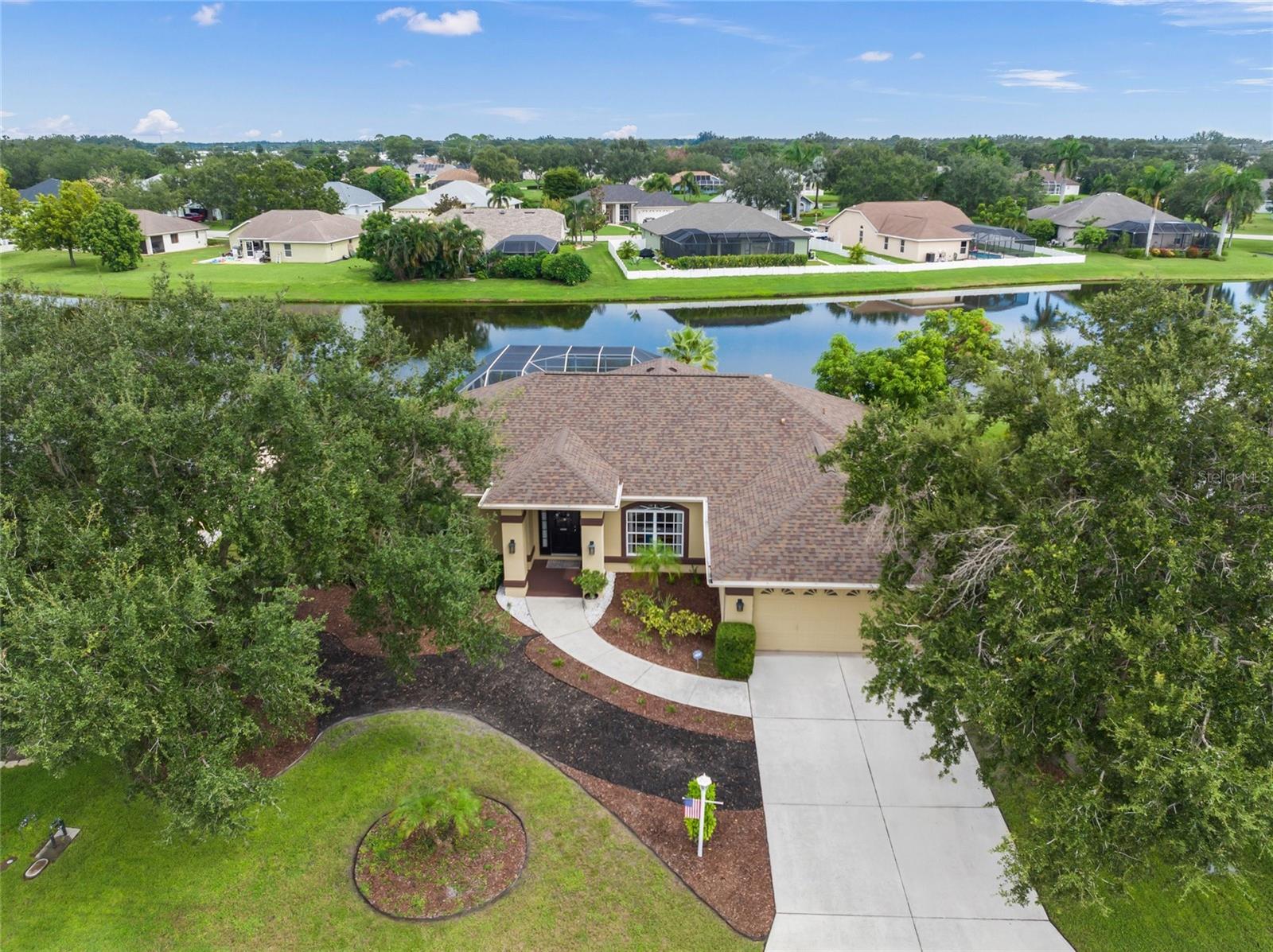 Discover elevated Florida living at 4542 35th Avenue Circle E, a beautifully appointed residence with a private pool and tranquil lake views, nestled in the exclusive, no-rental enclave of Sugar Mill Lakes. This refined home is thoughtfully designed with a split floor plan that offers both privacy and functionality, making it ideal for families or hosting guests. Recent upgrades include a brand-new roof and state-of-the-art pool equipment installed in 2024, a high-efficiency A/C system and screened pool enclosure added in 2023, and a modern hot water tank from 2020.
Step into your private backyard retreat, where a sparkling fiberglass pool is surrounded by lush landscaping, perfect for year-round relaxation. Inside, the open-concept layout is filled with natural light, creating a seamless flow between living, dining, and entertaining spaces. The community enhances your lifestyle with amenities such as tennis courts, a playground, and scenic lake views that add to the sense of serenity and connection. With low monthly HOA fees and a neighborhood that reflects pride of ownership, this move-in-ready gem offers a perfect blend of sophistication, convenience, and tranquility. Schedule your private showing today and discover the lifestyle you’ve been dreaming of.