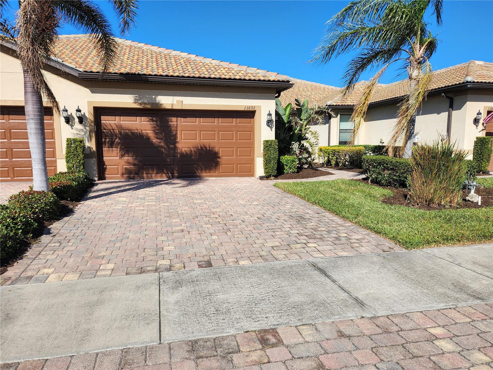Experience a vacation lifestyle in the vibrant resort-style community of Islandwalk, packed with every amenity you could ever wish for. This stunning 2016 waterfront villa, featuring an extended lanai, is being sold fully furnished, including wall art, a golf cart, and outdoor furnishings. The sectional sofa boasts three recliners, two of which are electric. The car is available separately.
You'll appreciate several extras, such as the extended lanai overlooking the lake, a murphy bed in the flex room so you have a 3rd bedroom for guests, six-panel doors, chic ceiling fans, a laundry closet, hurricane and plantation shutters, a built-in desk in the kitchen, 42" cabinets with crown molding, a solar tube for added light, tile flooring throughout, a vanity space in the master bath, stainless steel appliances, an open floor plan, granite countertops, an epoxy-coated garage floor, pull-down attic stairs with decking for storage, a new quiet belt-driven garage door opener, a 200 amp electrical panel, and a reverse osmosis system in the kitchen for the sink and ice.
Location-wise, this area of the community is conveniently close to the main gate and the clubhouse. Be sure to explore the fantastic amenities during your visit! Enjoy a lap pool along with two resort-style pools, a remarkable fitness center, twelve Pickleball courts, eight Har-Tru tennis courts, ping pong and pool tables, a library, playground, dog park, outdoor grilling area, basketball, and much more. The main gate provides access to Route 41, while the side gate leads directly into Wellen Park, where shopping, dining, and entertainment await at Tomahawk Tiki and the Atlanta Braves Stadium in Cool Today Park.