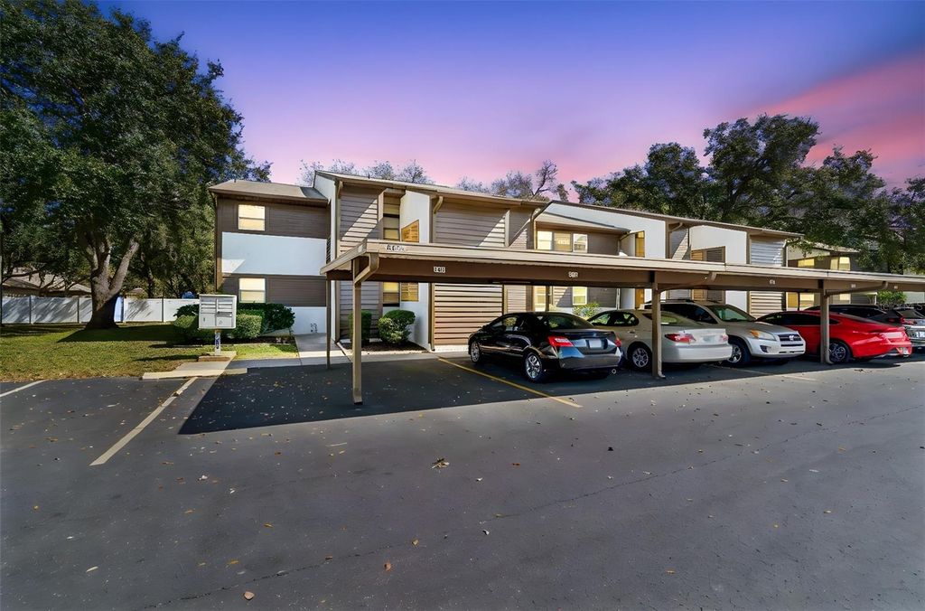 Photo of 4056 Passport Lane #102, New Port Richey, FL 34653 (MLS # TB8480450)