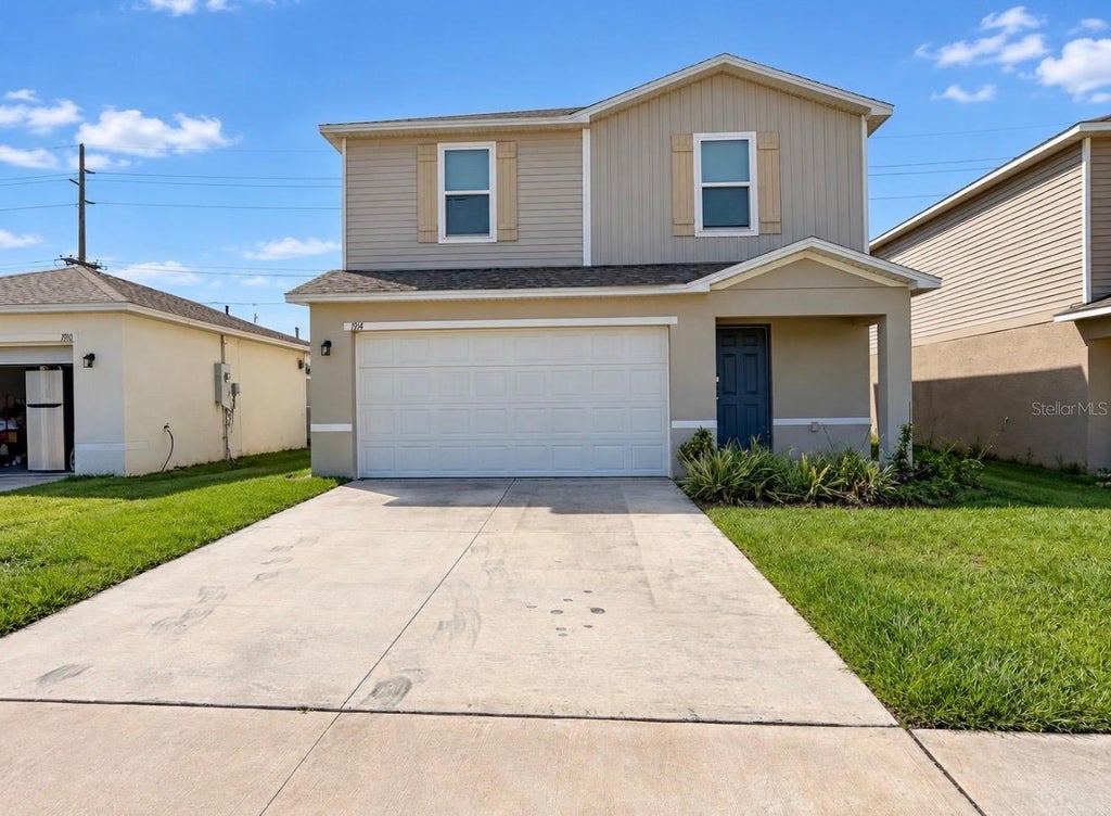 Photo of 1914 Golden Beak Drive, Eagle Lake, FL 33839 (MLS # O6449654)