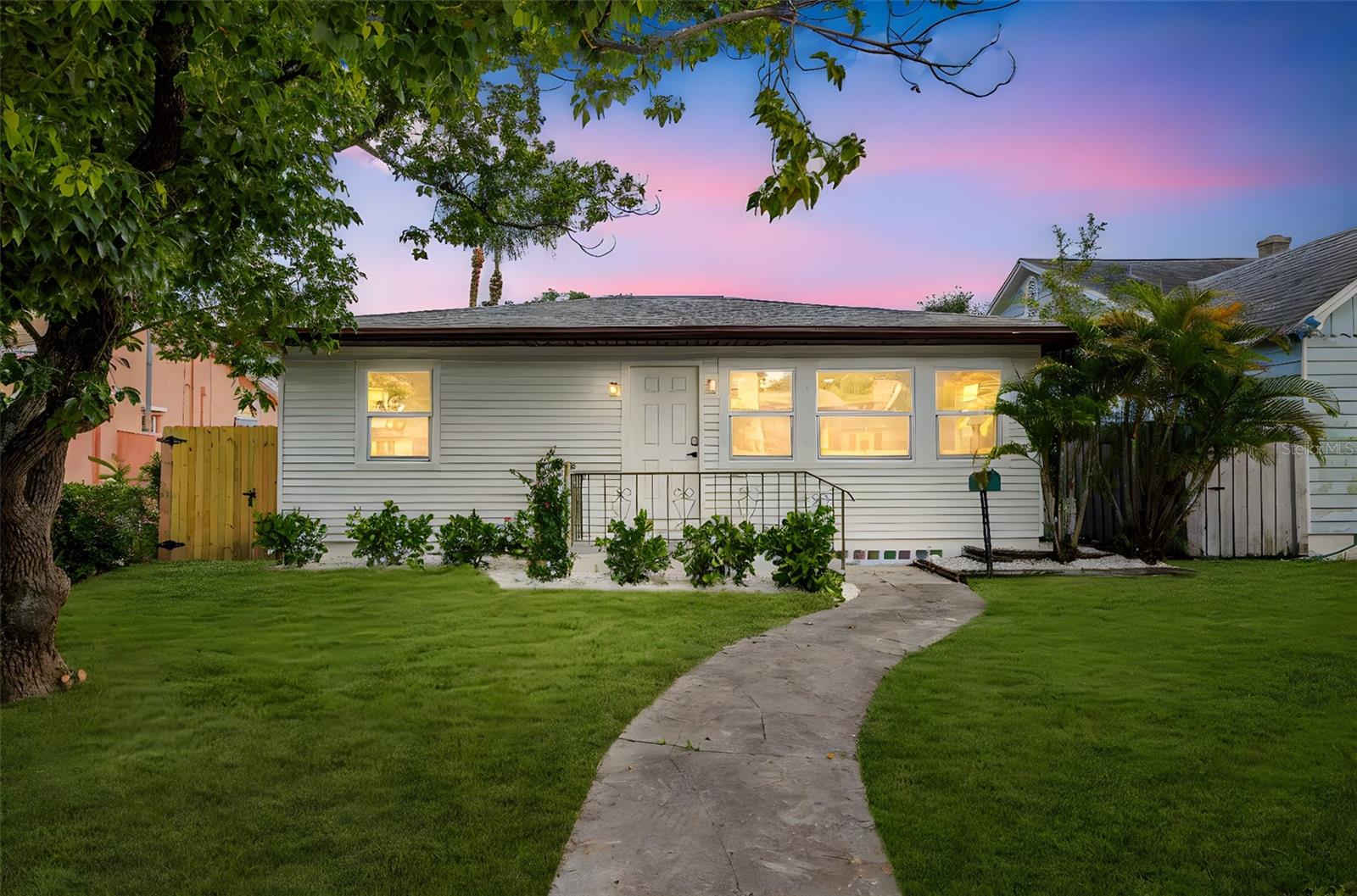 Beautifully renovated 3 bed, 2 bath home in the highly sought-after Euclid neighborhood, non-flood zone and packed with upgrades! This 1,230 SqFt split floor plan offers an open-concept layout featuring a spacious primary ensuite with walk-in closet and walk-in shower. Enjoy peace of mind with impact-rated windows, a 2024 shingle roof, 2024 HVAC, and durable 2024 Hardie board siding. Modern finishes throughout include soft-close shaker cabinetry, quartz countertops, LG stainless steel appliances, and recessed LED lighting. Both bathrooms have been tastefully remodeled. Additional highlights include a 2025 gas-powered Rheem tankless water heater, 200 amp Square D panel, and laundry closet. Outdoors, find new fencing, decking, landscaping, and a backyard pre-plumbed for an outdoor kitchen. Turnkey living in a prime St. Pete location!