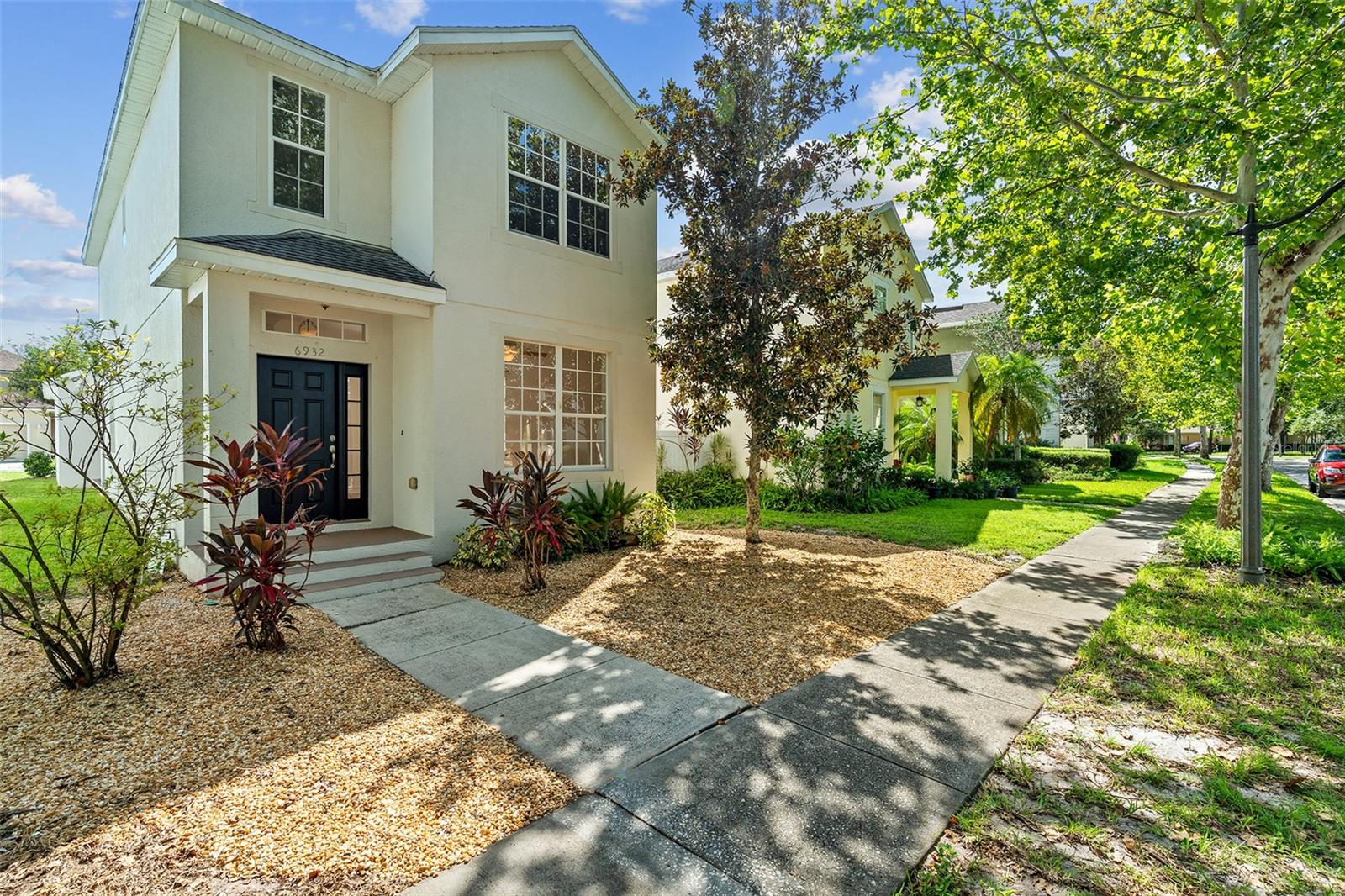 Step inside this fantastic 3 bedroom, 2.5 bath home and prepare to be impressed! Freshly painted downstairs, stairway and upstairs landing, it feels like new from the moment you walk in. Enjoy both a front family room and a rear living room, offering plenty of space to relax or entertain. The open concept design is enhanced by luxury vinyl flooring, elegant crown molding, and abundant natural light. The kitchen is a true highlight, featuring recessed lighting, a breakfast bar, and stainless steel appliances perfect for cooking and gathering. Upgrades include new quartz counter tops in kitchen and bathrooms. New HVAC (February 2025), hot water heater (2023), washer & dryer (2024), range (2024), Upstairs, you’ll find all three bedrooms plus a convenient laundry room. The spacious primary suite offers a garden tub, dual sinks, and a relaxing retreat at the end of the day. Enjoy morning coffee on the welcoming front porch or in the charming courtyard area. Complete with a detached garage, this move-in ready home blends comfort, style, and convenience. Don’t wait this gem won’t last long! Located in the desirable Harmony community, this family-friendly neighborhood offers a vibrant lifestyle with resort-style pools, a splash pad, parks, picnic areas, an observatory deck overlooking the lake, tennis courts, a fitness center, and a town square perfect for community events and casual gatherings. Harmony Golf Preserve is a Johnny Miller Signature Design Course and maintains the highest degree of environmental quality. Harmony Golf Preserve opened in 2002 and is built on a 260-acres. Plus, Harmony Community School is just a short distance away! Buyer to verify all room measurements. CDD taxes are included in the property taxes.