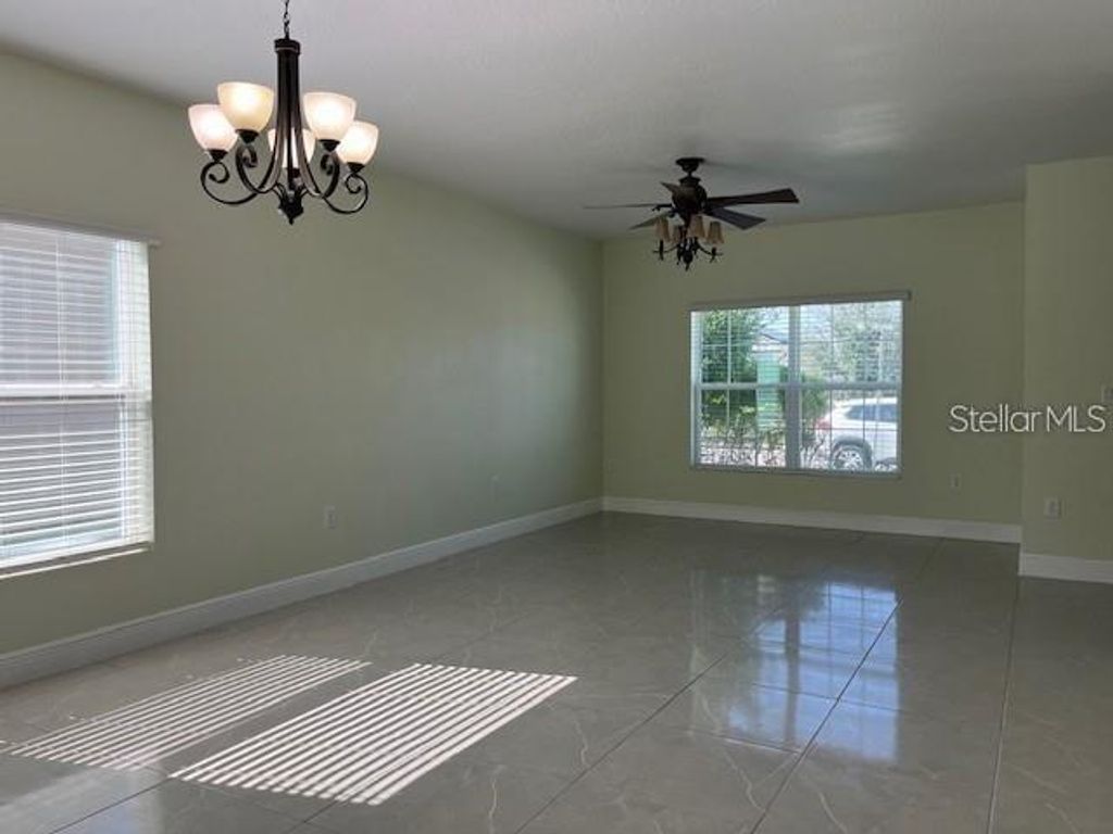 Photo of 4536 Lake Russell Road, Kissimmee, FL 34746 (MLS # S5141407)