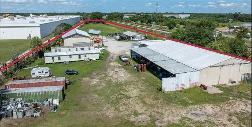 Don’t Miss This Rare Opportunity!  A high visibility and high traffic location on US Highway 92 East in Plant City with exceptional exposure. This is one of the largest parcels available along this corridor, boasting over 1,466 feet of road frontage on US Hwy 92 East.  This offering includes six (6) combined parcels totaling 4.28 +/- acres, zoned Manufacturing / Industrial / Commercial with so much MORE potential for future development or expansion.  The property features four (4) structures, including three (3) concrete block buildings, one (1) large pre-fab warehouse, and two (2) single-wide mobile homes. The entire site is fully fenced with a 6-foot chain-link fence topped with barbed wire and secured by gated access.  Utilities and infrastructure are already in place with City Water, three (3) septic tanks, four (4) electric meters, and 3-phase electric servicing the two largest buildings. Also included are two (2) 40-foot shipping containers for additional storage or operational use.  This is a strong income-producing property with four active, long-tenure tenants, making it ideal for investors, owner-users, or developers seeking immediate cash flow with long-term upside.  Easy access to I-4, 20 minutes to Tampa & 30 minutes to Orlando.  Schedule a private tour today to fully appreciate the potential of this property.