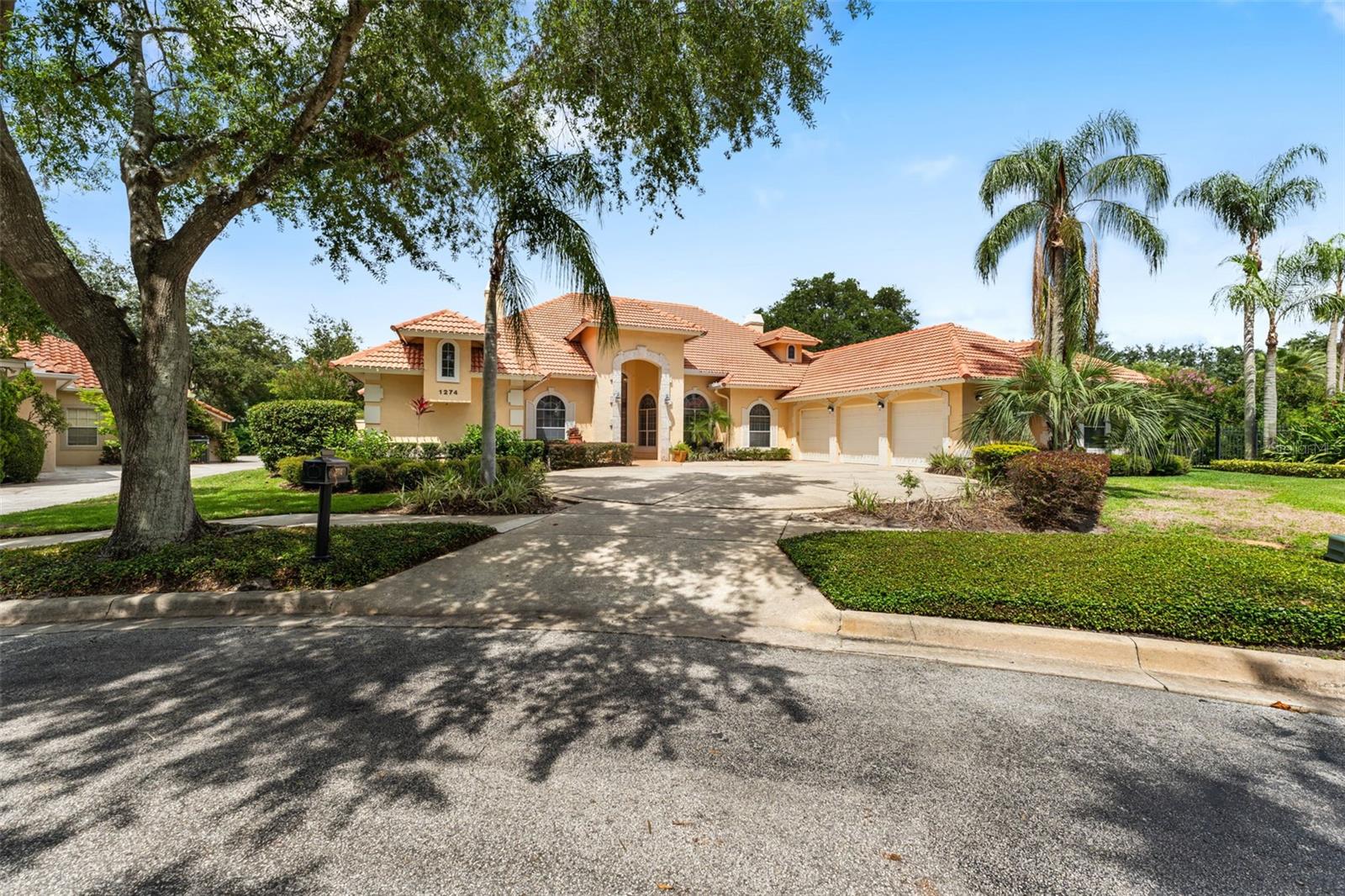Welcome to 1274 Prince Court—an elegant and thoughtfully renovated custom one-story pool home located in the prestigious gated community of Heathrow. Nestled at the end of a quiet cul-de-sac on a private lot, this beautifully updated residence offers 4 spacious bedrooms, 3 full bathrooms, and a dedicated executive office. Step through the striking glass and iron double doors into a grand foyer with brand-new carpet underfoot and soaring 22-foot cathedral ceilings that create an immediate sense of openness and sophistication. The living room provides stunning views of the newly painted saltwater pool and lush landscaping beyond, setting the tone for serene Florida living. To your right, a formal dining room is perfect for hosting, while the executive office to the left offers an ideal work-from-home setup. The renovated kitchen is a chef’s dream—featuring modern white cabinetry, granite countertops, a center island, new stainless steel appliances, and an open flow into the spacious family room, ideal for entertaining. Enjoy newer porcelain tile in the main living areas, brand-new luxury vinyl plank flooring in the bedrooms, and remote-controlled curtains throughout the home for modern convenience. The expansive primary suite includes transom windows that flood the space with natural light, a large walk-in closet, and a beautifully updated en-suite bath with hand-cut tile details, dual granite-topped vanities, and a custom walk-in shower. Two additional bedrooms, each with their own fully renovated baths, are tucked away on the opposite side of the home for maximum privacy—perfect for guests or family members. Step outside to your private backyard oasis, where a rock waterfall spills into the sparkling saltwater spa and pool, all enclosed by a wrought-iron fence and surrounded by mature landscaping. The covered lanai includes a summer kitchen and generous seating areas, making it ideal for outdoor gatherings year-round. Additional features include a side-entry three-car garage, circular driveway, and freshly painted interiors. This home combines custom elegance with modern upgrades for truly turnkey living. Located within the highly desirable Heathrow community, residents enjoy access to an exclusive country club, an 18-hole championship golf course designed by Ron Garl, tennis courts, playgrounds, and walking trails—all within a top-rated school district. Don’t miss the opportunity to make this luxurious and move-in ready property your next home!
