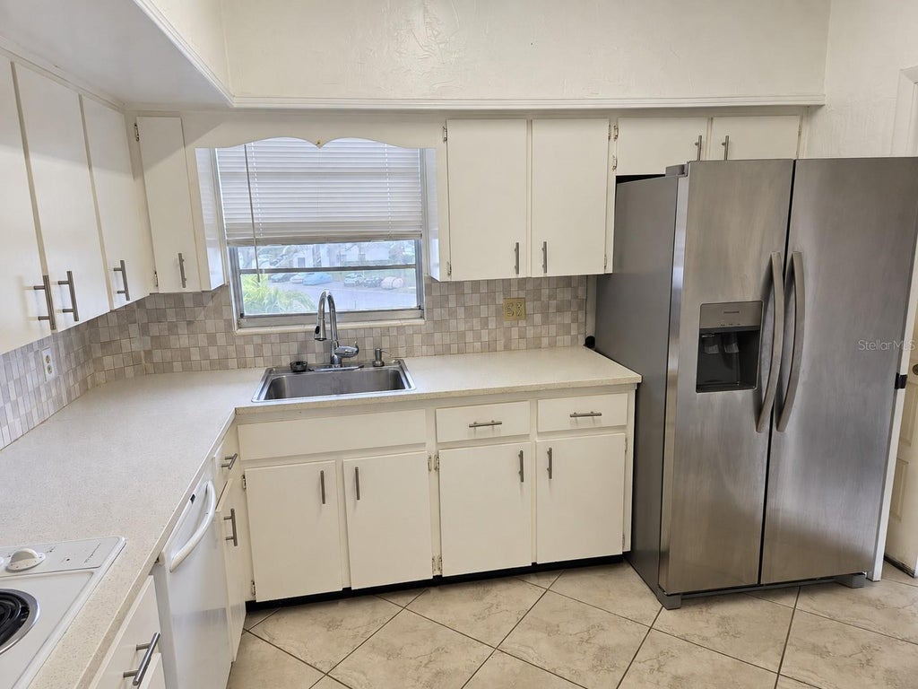 Photo of 2436 Rhodesian Drive #48, Clearwater, FL 33763 (MLS # TB8547611)