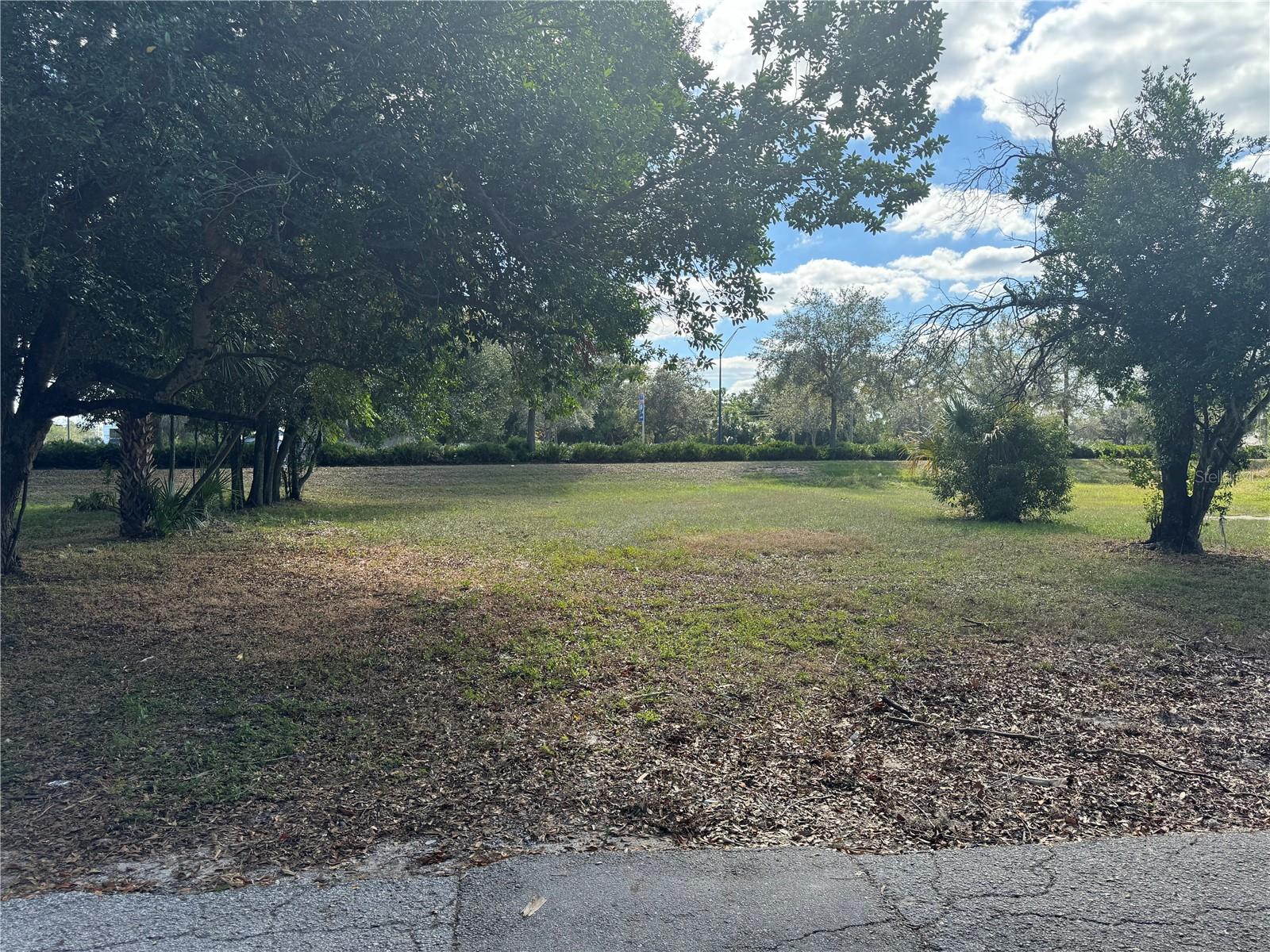 An exceptional investment opportunity: two adjacent lots for sale, Lot priced individually (see also MLS#P4933411) available individually or as a combined parcel, ideally suited for multi-family residential development. These properties are located in the thriving city of Lakeland, perfectly situated between Tampa and Orlando, offering unparalleled access to I-4, major hospitals, vibrant shopping districts, and the city's downtown area. This lot, zoned MF-22, presents a prime location for constructing your dream home or a duplex, providing both comfortable living and the potential for rental income. Alternatively, the acquisition of both adjacent lots would allow for a larger-scale multi-family development project. This presents a compelling investment opportunity for discerning builders and investors seeking to capitalize on Lakeland's robust growth and strategic location. Please contact me or your Agent to discuss this opportunity further and arrange a showing.