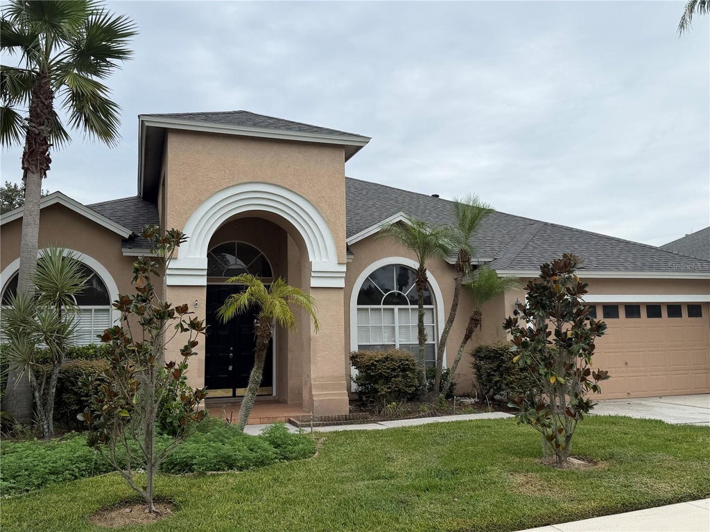 Photo of 9912 Kingshyre Way, Tampa, FL 33647 (MLS # TB8554669)