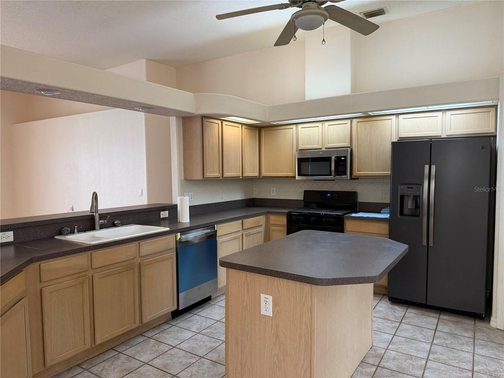 Photo of 9912 Kingshyre Way, Tampa, FL 33647 (MLS # TB8554669)