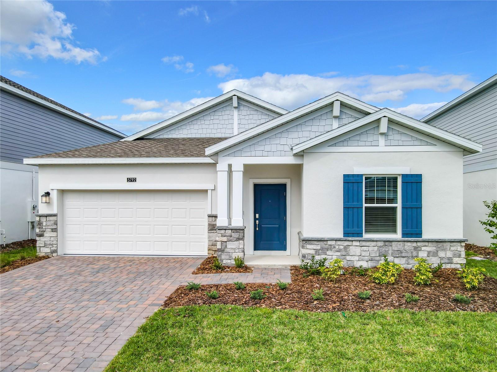Located in the desirable Bridgewalk community, this beautiful single-story home offers access to exceptional amenities including a pool, fitness center, two pickleball courts, playground, and dock. Inside, a welcoming foyer leads to an open-concept layout combining the dining room, kitchen, and family room, which seamlessly extends to a covered patio—perfect for outdoor entertaining or relaxing. The home features four spacious bedrooms, including a luxurious owner’s suite with a large bedroom, elegant bathroom, and generously sized walk-in closet, offering both comfort and style in a prime location.