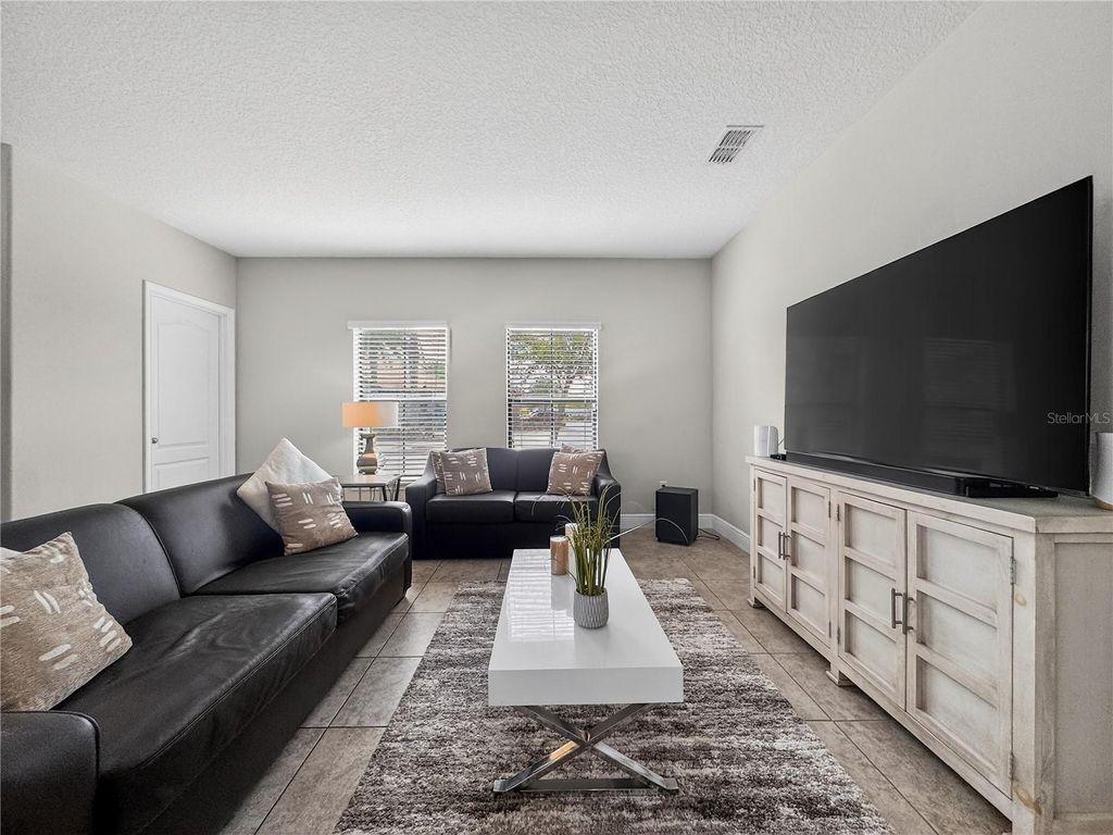 Photo of 127 Kenny Boulevard, Haines City, FL 33844 (MLS # S5145879)