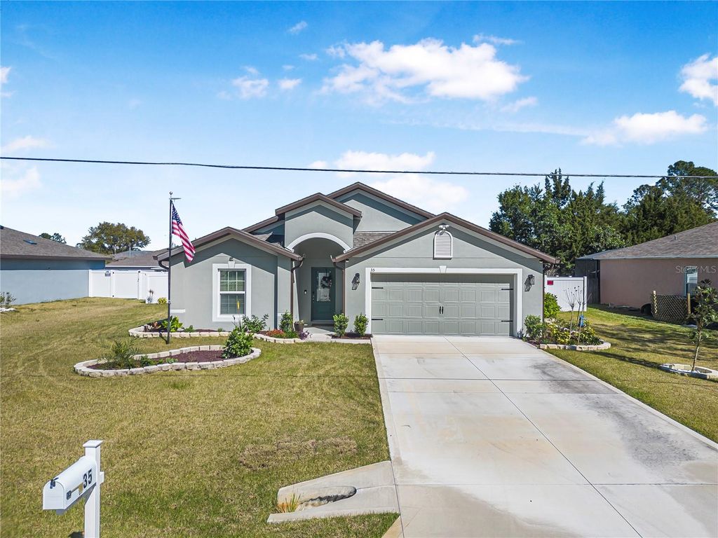 Photo of 35 Rollins Lane, Palm Coast, FL 32164 (MLS # A4688583)