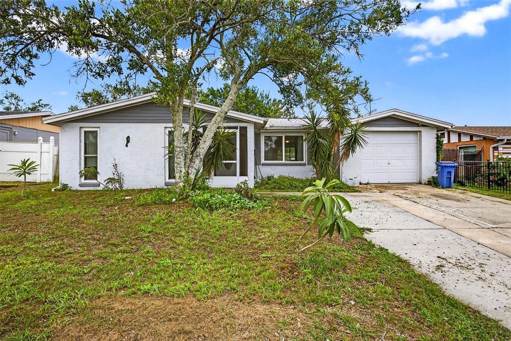 Photo of 7814 Burnham Drive, Port Richey, FL 34668 (MLS # TB8403836)