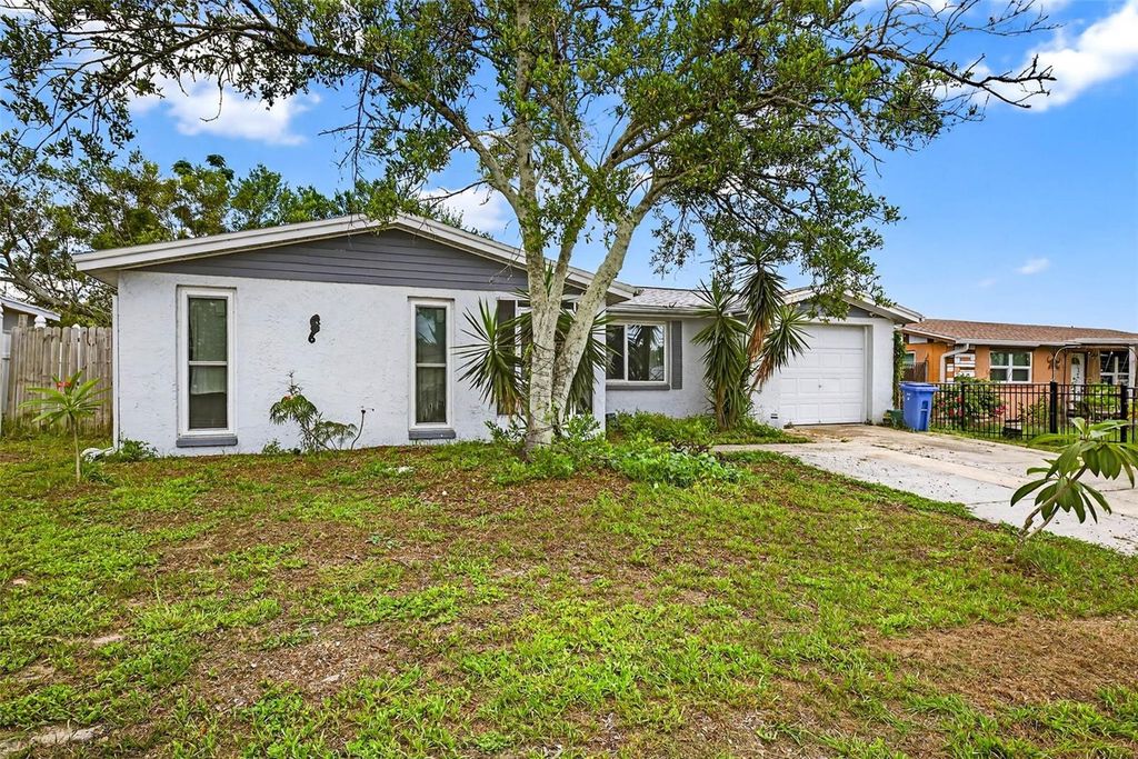 Photo of 7814 Burnham Drive, Port Richey, FL 34668 (MLS # TB8403836)