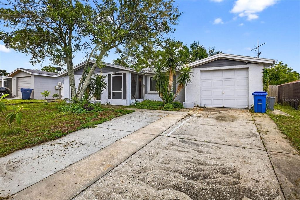 Photo of 7814 Burnham Drive, Port Richey, FL 34668 (MLS # TB8403836)