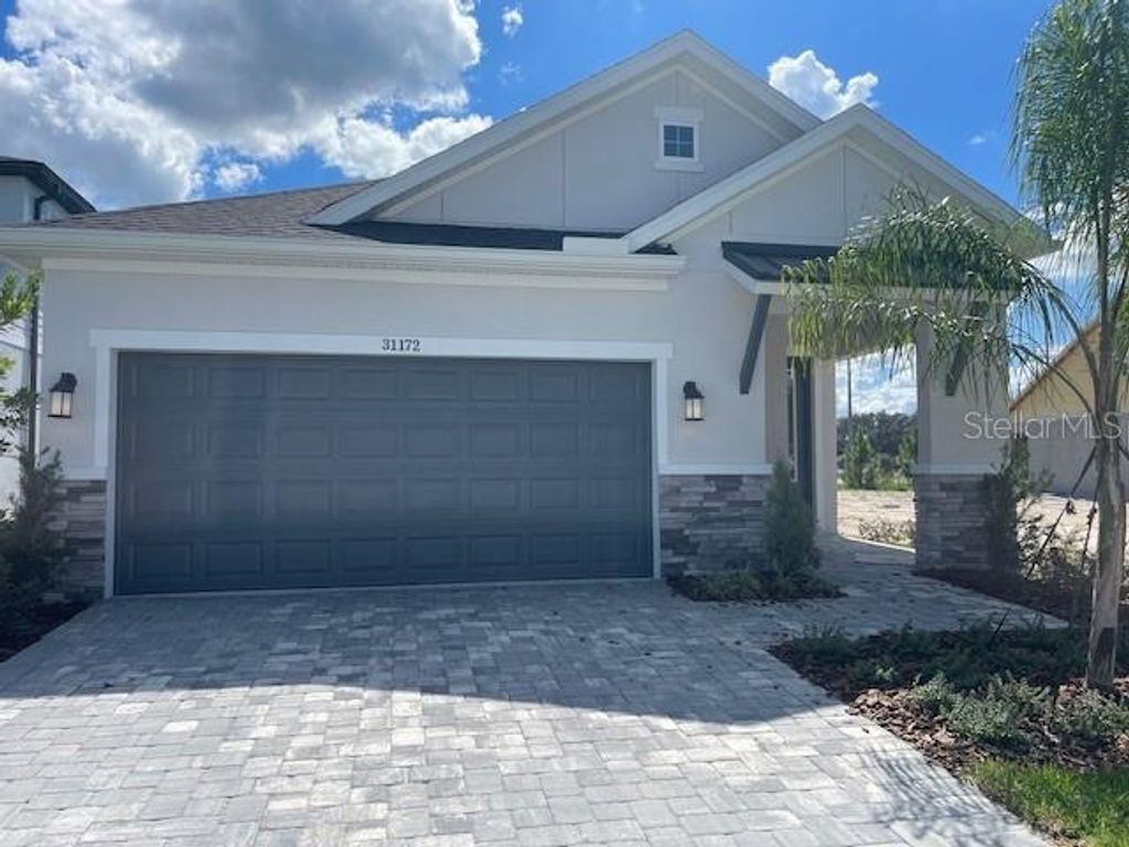 Photo of 31172 Pendleton Landing Circle, Wesley Chapel, FL 33545 (MLS # TB8401220)
