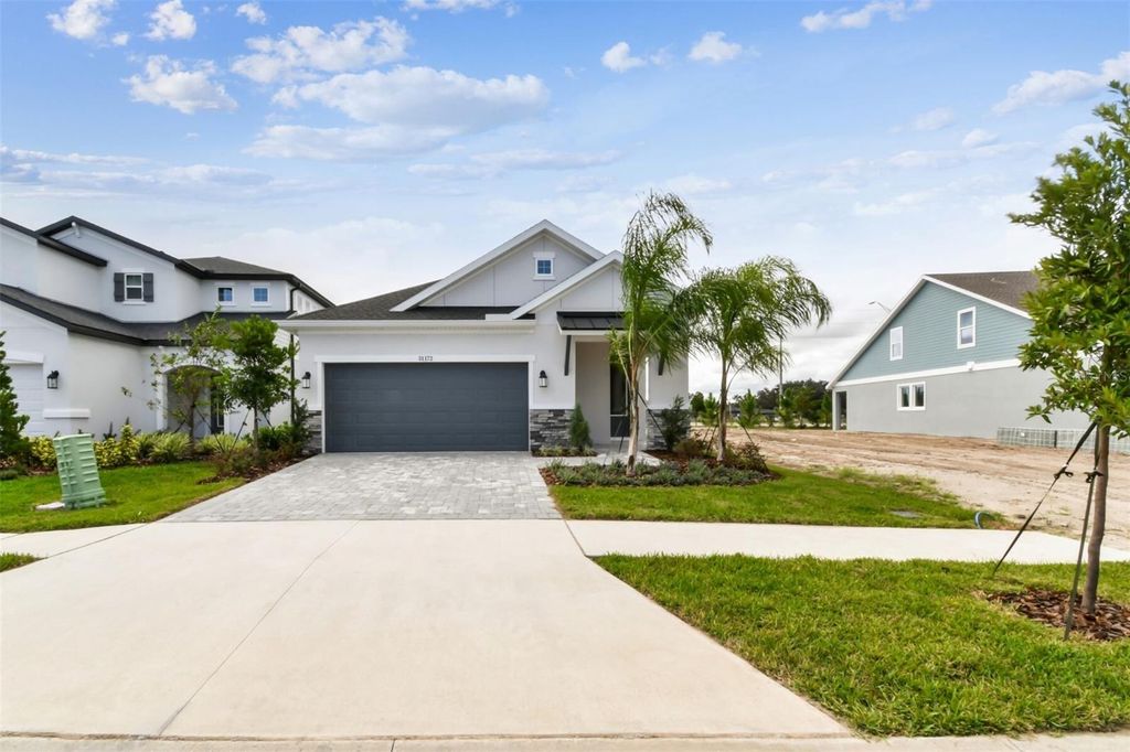 Photo of 31172 Pendleton Landing Circle, Wesley Chapel, FL 33545 (MLS # TB8401220)