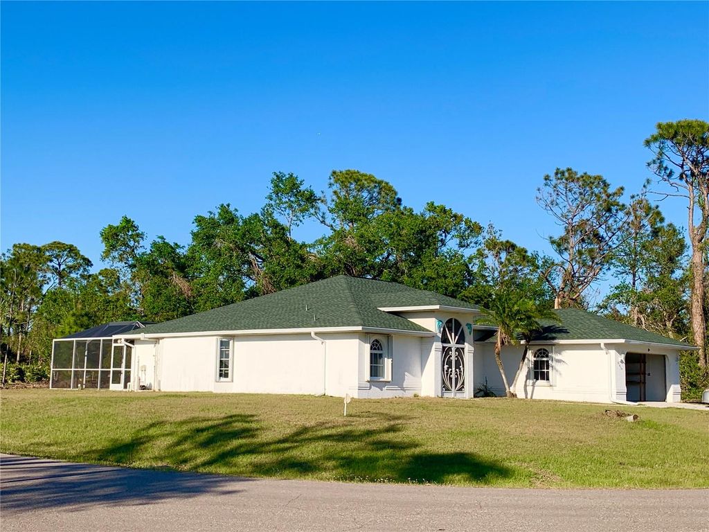 Photo of 21464 Bingham Avenue, Port Charlotte, FL 33954 (MLS # C7516163)