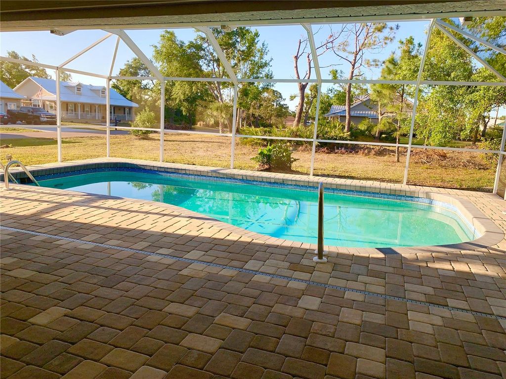 Photo of 21464 Bingham Avenue, Port Charlotte, FL 33954 (MLS # C7516163)