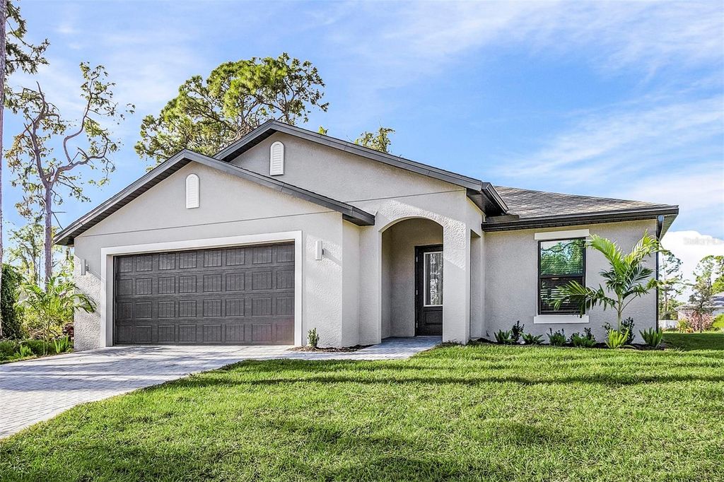 Photo of 6945 Beckwith Avenue, North Port, FL 34291 (MLS # TB8427113)