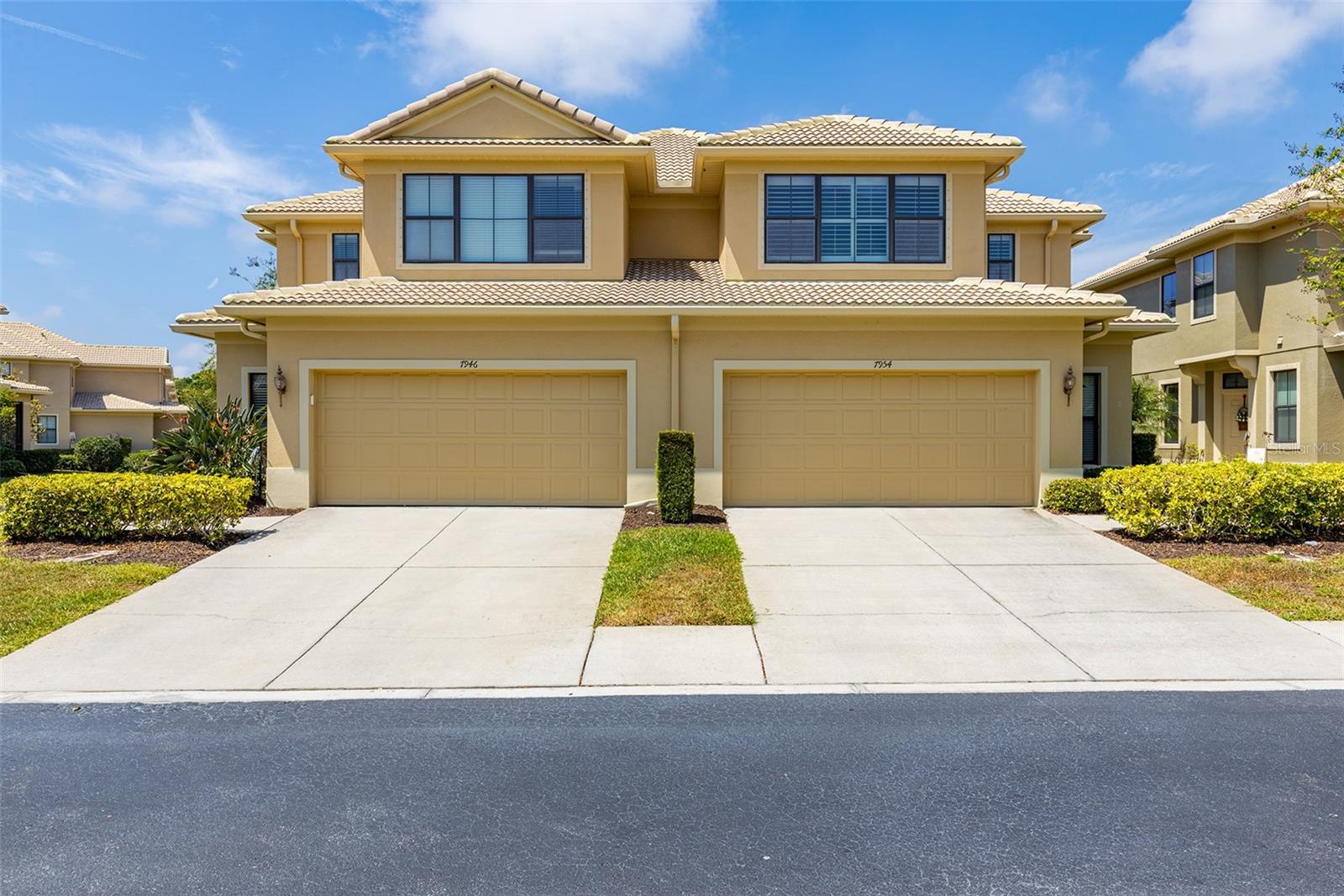 Under contract-accepting backup offers. Back on the market after Buyers contingent sale fell through. Amazing END UNIT LUXURY TOWNHOME with a 2 CAR GARAGE in the quiet, GATED Community of HIDDEN BAYOU. The moment you walk into this home you will be delighted by the soaring ceilings creating an open and inviting space for family and friends. This home offers a FIRST FLOOR MASTER SUITE with a huge walk-in closet by Closets by Design. There is also an additional double wall closet for linens and other necessities. The ensuite bathroom offers a double sink vanity, stand up shower and soaking tub. The kitchen has upgraded 42” wood cabinetry with custom sliding pull outs, a pantry, granite counters, stainless steel appliances, a breakfast bar and a dining space in the kitchen. This townhome features crown molding and beautiful custom Plantation Shutters throughout. The living room opens to a screened porch overlooking well-manicured green spaces. Start your morning off by relaxing as you enjoy your morning coffee or watch the beautiful sunsets on your private covered lanai! Heading upstairs you will find a spacious Loft/Flex space which can be used for Media Room, Playroom and so much more! There are 2 additional bedrooms upstairs and a full-size bathroom with tub/shower combo. There is a half bath down stairs and a laundry room which leads out to the OVERSIZED 2 Car Garage! The garage floor has a lifetime epoxy finish. Vivant security system and the pro cam camera system both stay with the home and can be activated by the new owner, Nest thermostat and Smoke alarms, garage door opener 2019, Pest control and HVAC maintenance contracts. HOA covers Roof Replacement (currently 10 years old), Exterior Painting, Lawn Care, Internet, Cable, Trash, Road, Street Lights, Pool, Gates and common areas. The exterior was last painted in 2019. To top everything off, this community is an all age, pet friendly community built in 2012 that also offers private WATER ACCESS to the Bayou for canoeing / kayaking! Make your appointment to see this beautiful home and you can soon be Loving the Florida Life!