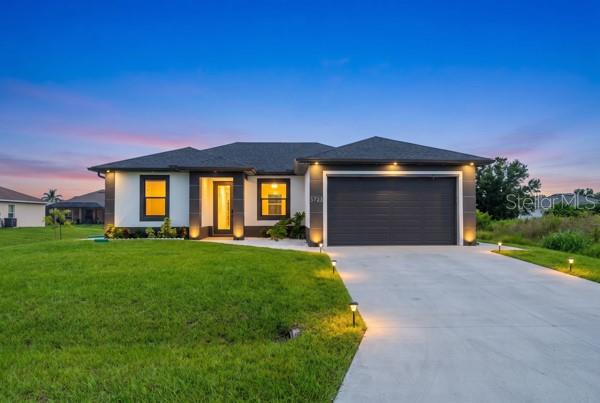 Photo of 3723 6th Street SW, Lehigh Acres, FL 33976 (MLS # C7531287)
