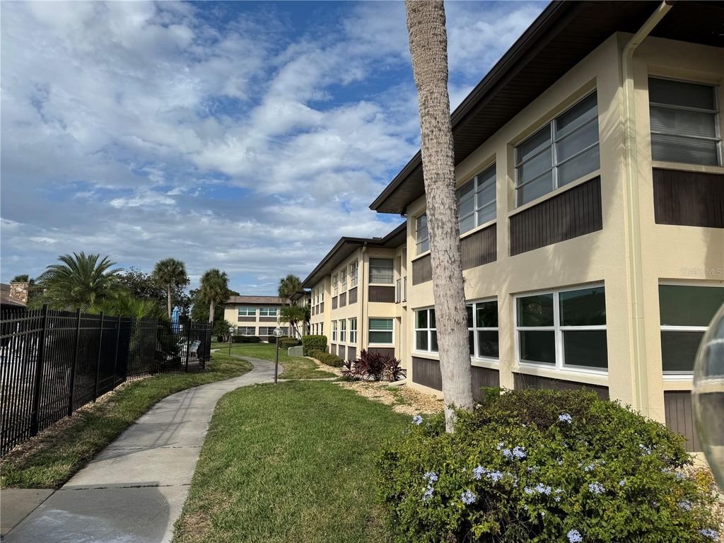 Photo of 5111 Amulet Drive #105, New Port Richey, FL 34652 (MLS # W7878893)