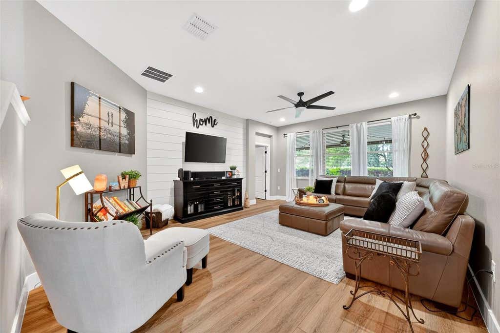 Photo of 4025 Lake Bosse View Drive, Orlando, FL 32810 (MLS # G5113220)