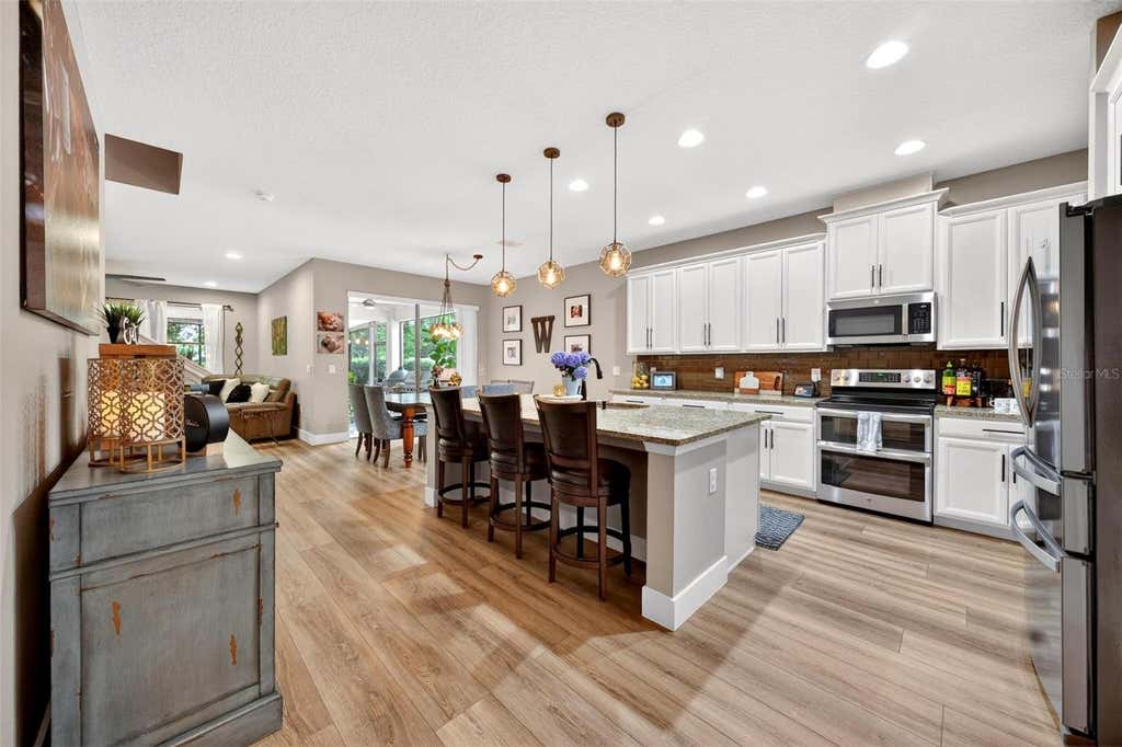Photo of 4025 Lake Bosse View Drive, Orlando, FL 32810 (MLS # G5113220)