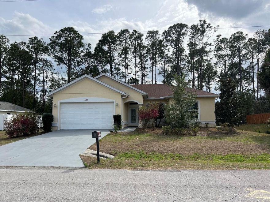 Welcome to your next home at 119 Panorama Drive in beautiful Palm Coast! This thoughtfully designed 3-bedroom, 2-bath, 2-car garage rental offers comfort, privacy, and energy-efficient living in the peaceful and desirable Pine Grove subdivision. Built in 2018, this Certified Green Home and ENERGY STAR® Certified Home was designed with improved indoor air quality in mind—creating a healthier, more comfortable, and virtually allergen-reduced living environment while keeping utility costs low. The home features a bright, open floor plan with no carpet throughout, making it ideal for easy maintenance and modern living. The spacious kitchen boasts a large center island, granite countertops, genuine wood cabinetry, stainless steel appliances, and a microwave vented to the exterior—all overlooking the dining and living areas, perfect for entertaining family and friends. The light and airy primary suite includes double sinks, a large luxury tiled shower with an elegant glass door, and a walk-in closet with direct bedroom access. High and tray ceilings throughout the home enhance the sense of space, while laminate and tile flooring, ceiling fans in every room, and energy-efficient Low-E windows elevate both comfort and style. Step outside to enjoy a spacious covered and screened porch, offering added privacy and serene views. The backyard is partially fenced and bordered by a natural preserve to the rear and one side, creating a peaceful outdoor retreat. A popular split floor plan provides excellent indoor privacy as well. Located in a quiet neighborhood close to shopping, parks, trails, and beaches, this home truly lets you save money, live healthier, and feel at ease. Proof of income required. Call the listing agent today to schedule your private showing